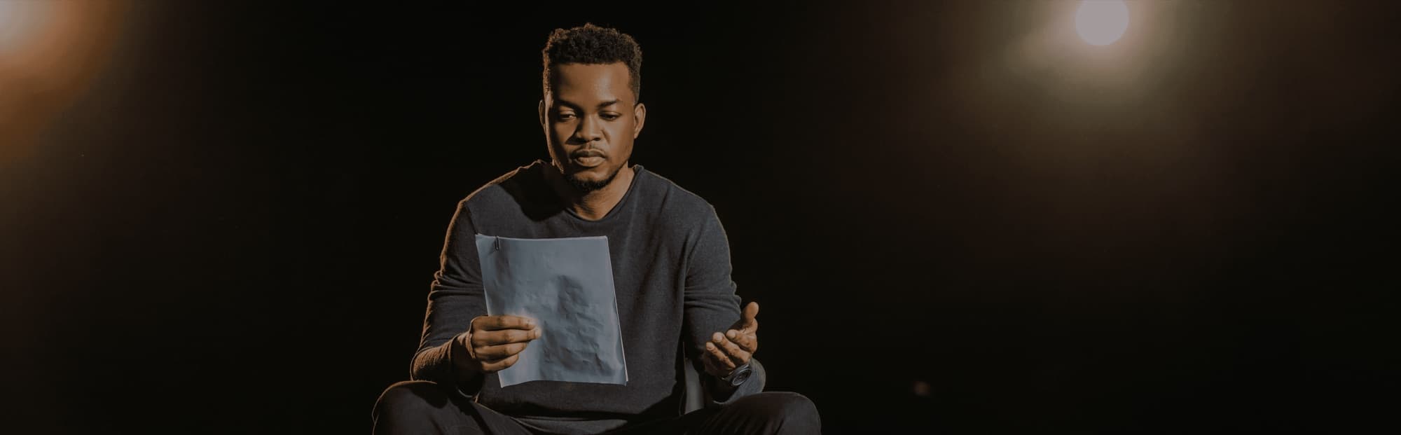 An acting coach working with a student on a scene